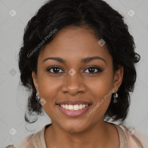 Joyful black young-adult female with long  brown hair and brown eyes