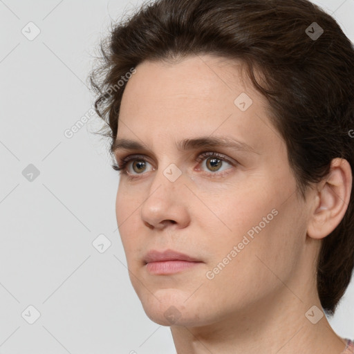 Neutral white young-adult female with medium  brown hair and brown eyes