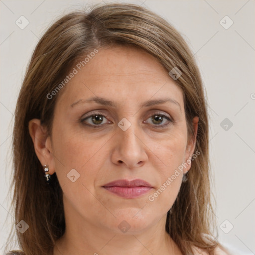 Joyful white adult female with medium  brown hair and brown eyes