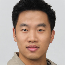 Neutral asian young-adult male with short  black hair and brown eyes