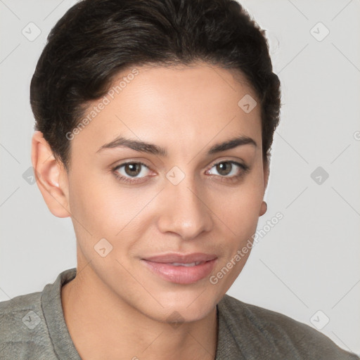 Joyful white young-adult female with short  brown hair and brown eyes