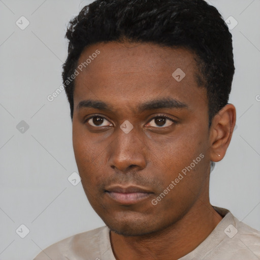 Neutral black young-adult male with short  black hair and brown eyes