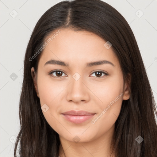 Joyful latino young-adult female with long  brown hair and brown eyes