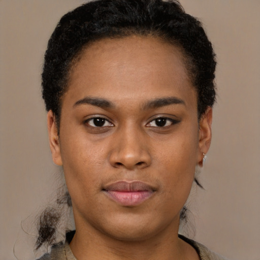 Neutral black young-adult female with short  black hair and brown eyes