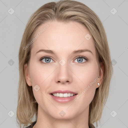 Joyful white young-adult female with medium  brown hair and blue eyes