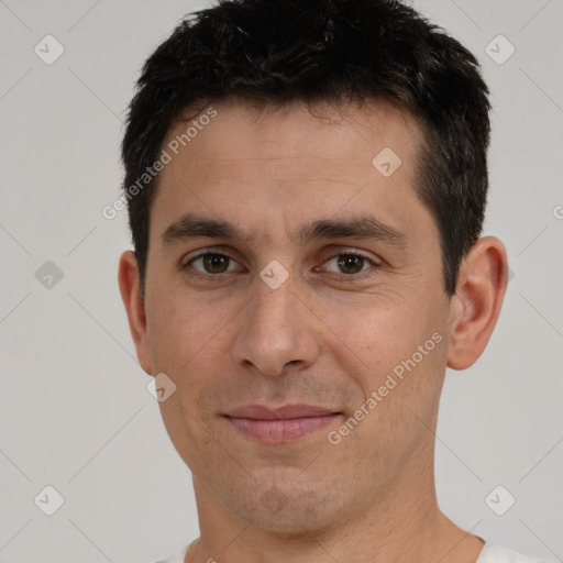 Joyful white young-adult male with short  brown hair and brown eyes