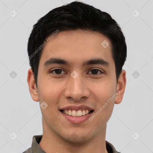 Joyful white young-adult male with short  black hair and brown eyes