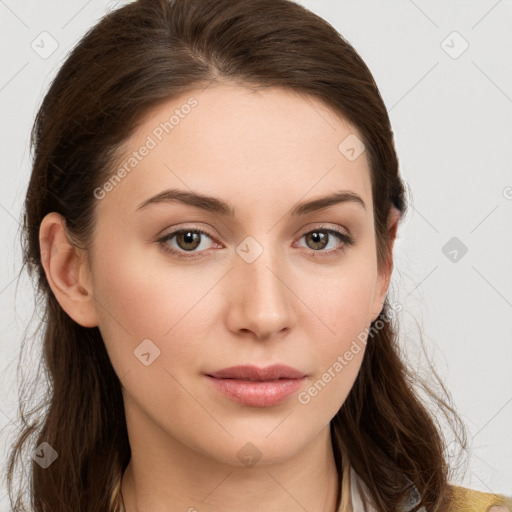 Neutral white young-adult female with long  brown hair and brown eyes