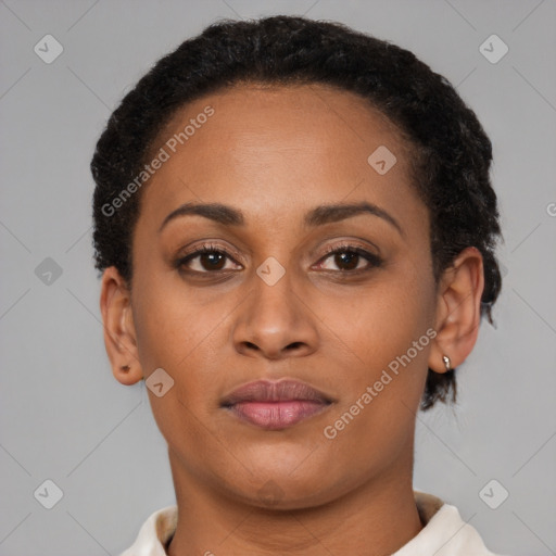 Joyful latino young-adult female with short  brown hair and brown eyes