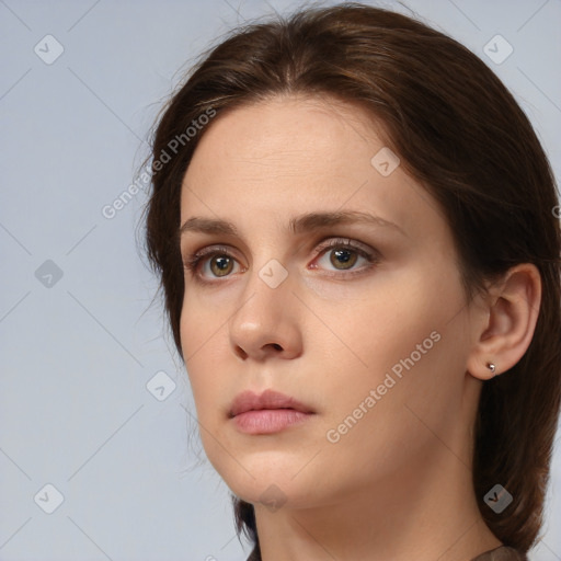 Neutral white young-adult female with medium  brown hair and brown eyes