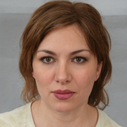 Neutral white young-adult female with medium  brown hair and brown eyes