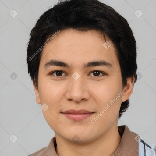 Joyful asian young-adult male with short  black hair and brown eyes