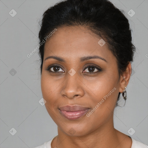 Joyful black young-adult female with medium  brown hair and brown eyes