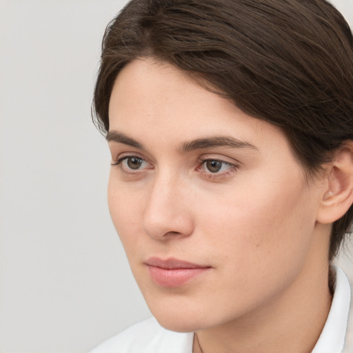 Neutral white young-adult female with medium  brown hair and brown eyes