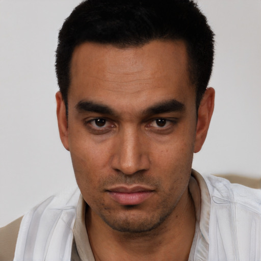 Neutral white young-adult male with short  black hair and brown eyes