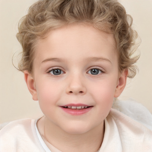 Joyful white child female with short  brown hair and blue eyes