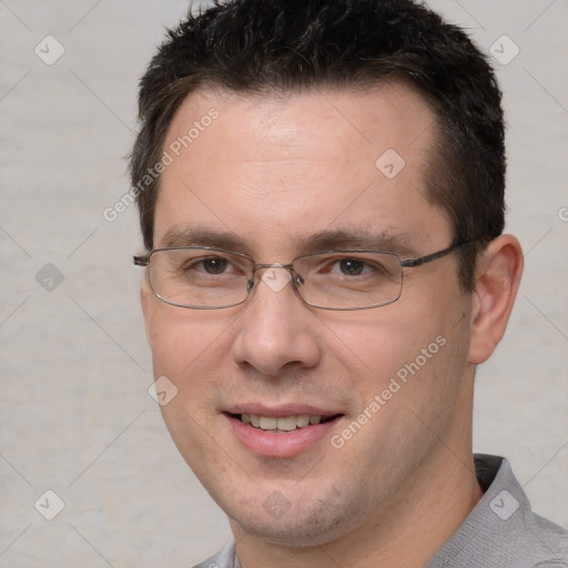 Joyful white adult male with short  brown hair and brown eyes