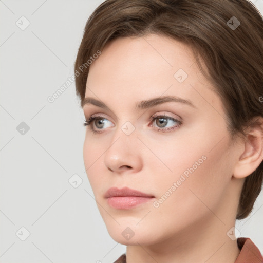 Neutral white young-adult female with medium  brown hair and grey eyes