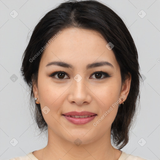 Joyful latino young-adult female with medium  brown hair and brown eyes