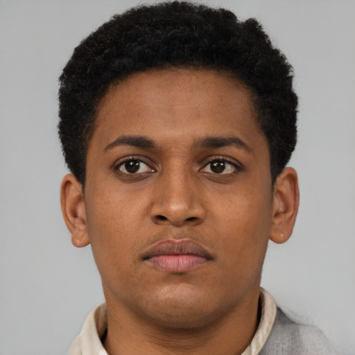 Neutral black young-adult male with short  brown hair and brown eyes