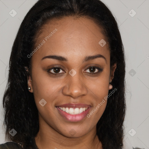 Joyful latino young-adult female with long  brown hair and brown eyes