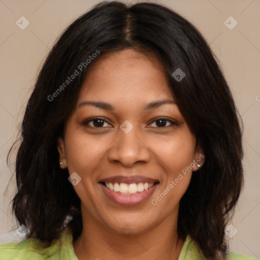 Joyful black young-adult female with medium  brown hair and brown eyes