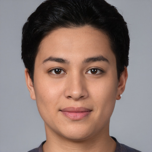 Joyful white young-adult female with short  black hair and brown eyes
