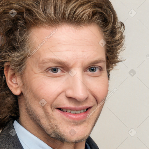 Joyful white adult male with short  brown hair and grey eyes