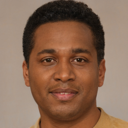 Neutral black young-adult male with short  brown hair and brown eyes