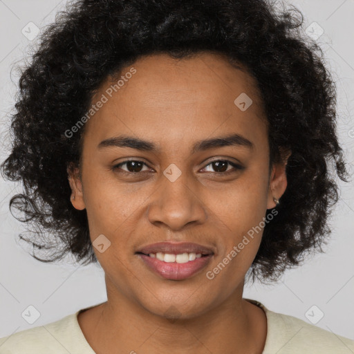 Joyful black young-adult female with medium  brown hair and brown eyes