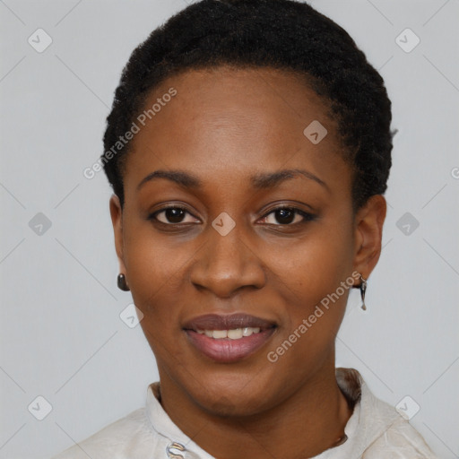 Joyful latino young-adult female with short  black hair and brown eyes