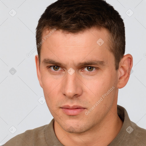 Neutral white young-adult male with short  brown hair and brown eyes