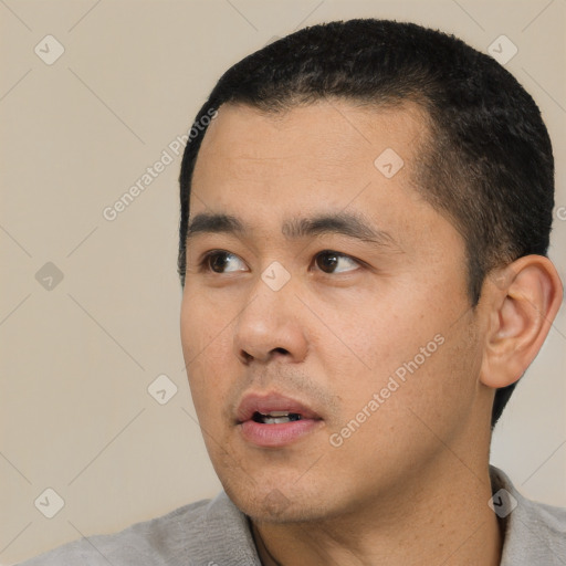 Neutral white young-adult male with short  black hair and brown eyes