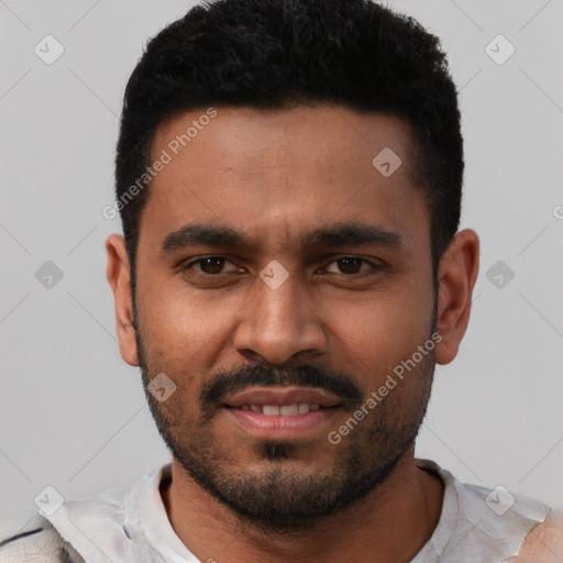 Joyful black young-adult male with short  black hair and brown eyes