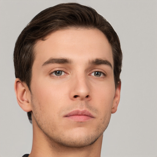 Neutral white young-adult male with short  brown hair and brown eyes