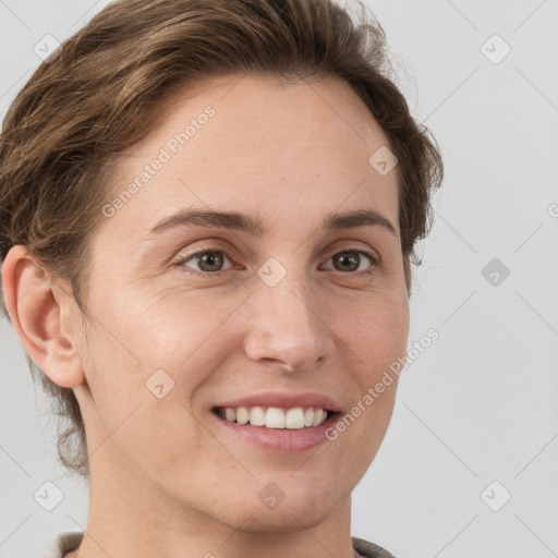 Joyful white young-adult female with short  brown hair and grey eyes