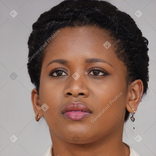 Neutral black young-adult female with short  brown hair and brown eyes