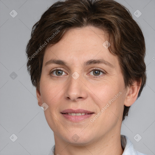 Joyful white adult female with short  brown hair and brown eyes