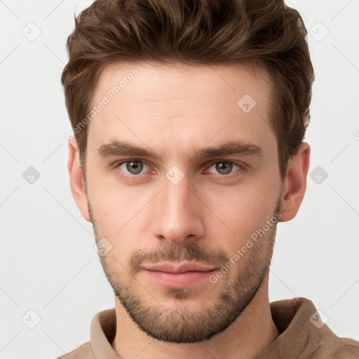 Neutral white young-adult male with short  brown hair and grey eyes