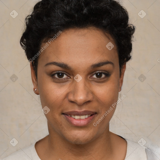 Joyful black young-adult female with short  black hair and brown eyes