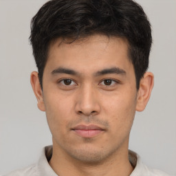 Neutral asian young-adult male with short  brown hair and brown eyes