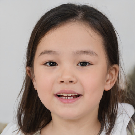 Joyful white child female with medium  brown hair and brown eyes