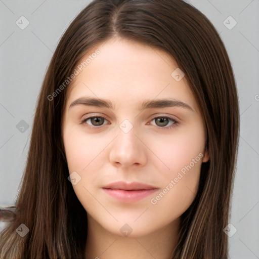 Neutral white young-adult female with long  brown hair and brown eyes