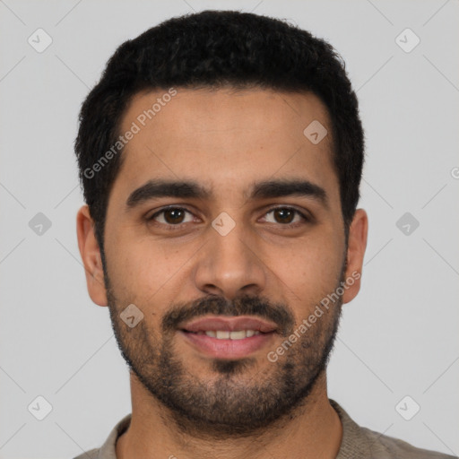 Joyful latino young-adult male with short  black hair and brown eyes