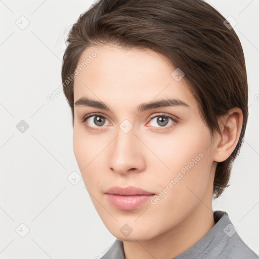 Neutral white young-adult female with medium  brown hair and brown eyes