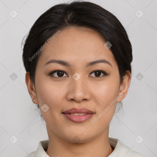 Joyful asian young-adult female with short  brown hair and brown eyes