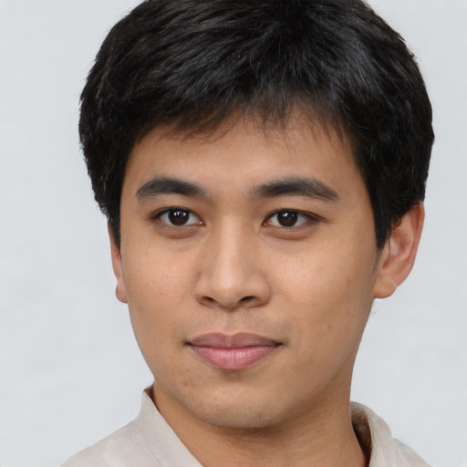 Neutral asian young-adult male with short  brown hair and brown eyes