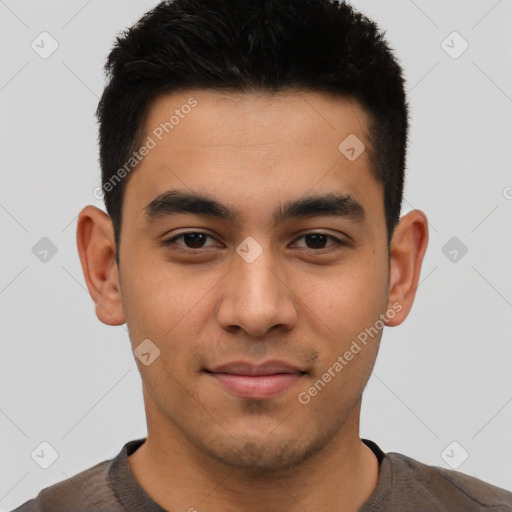 Joyful latino young-adult male with short  brown hair and brown eyes