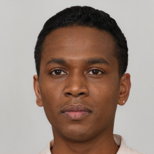 Neutral black young-adult male with short  black hair and brown eyes