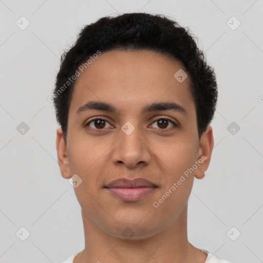 Joyful latino young-adult male with short  brown hair and brown eyes